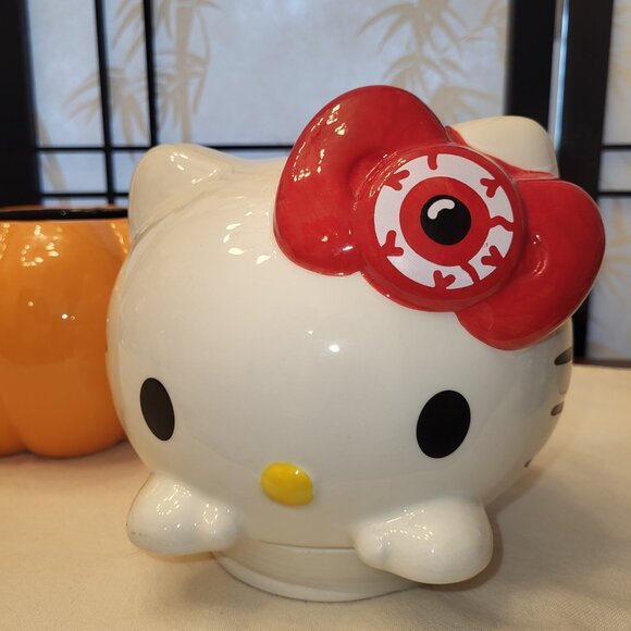 Hello Kitty Ceramic Pumpkin w/ Spooky Red Eye Bow Cookie Coffee Pod Jar - Picture 3 of 5